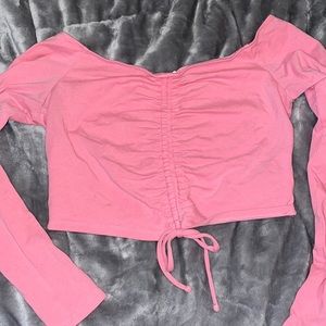 Bubblegum pink off the shoulder crop top. Size M.